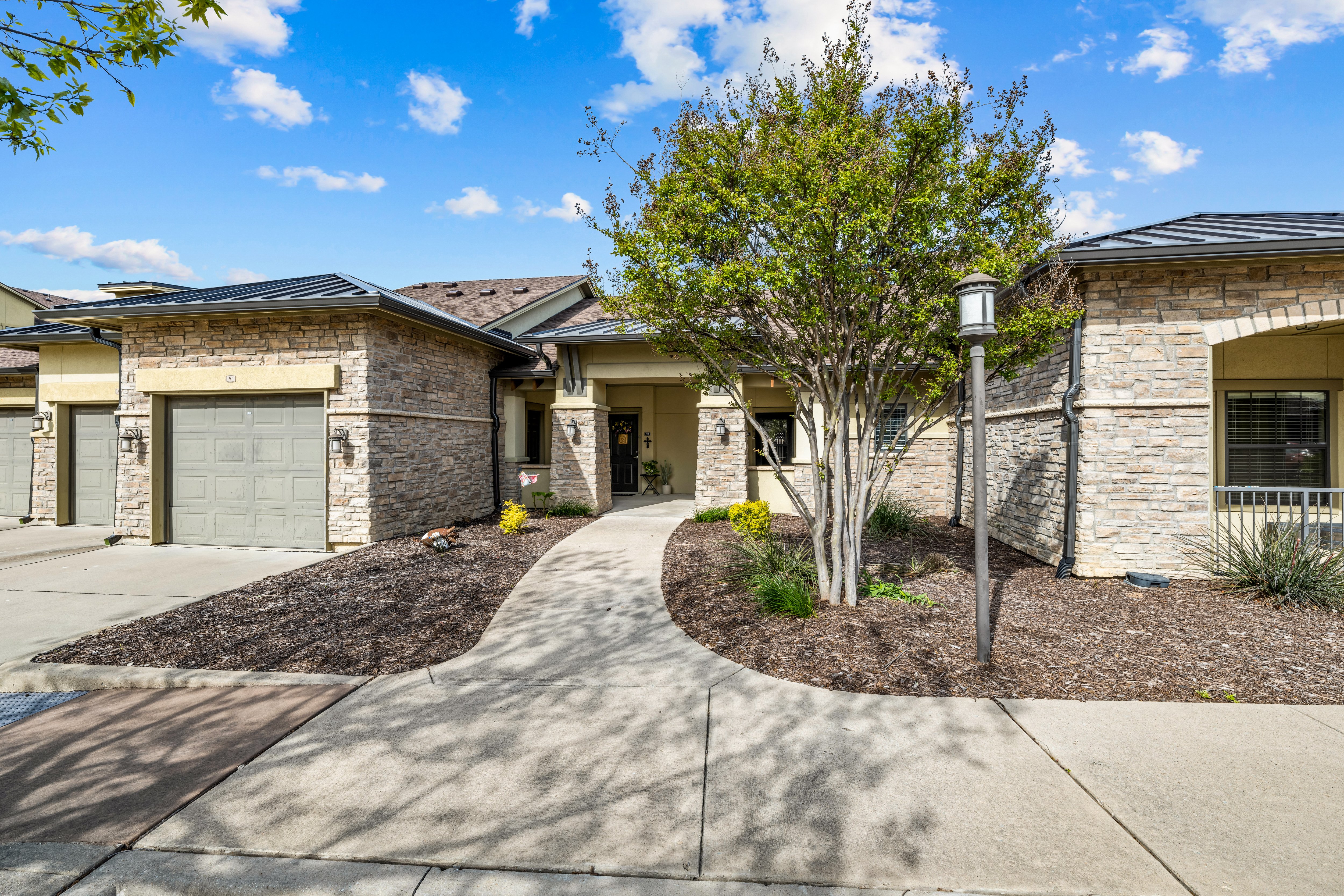 Discovery Village Twin Creeks apartment home exterior